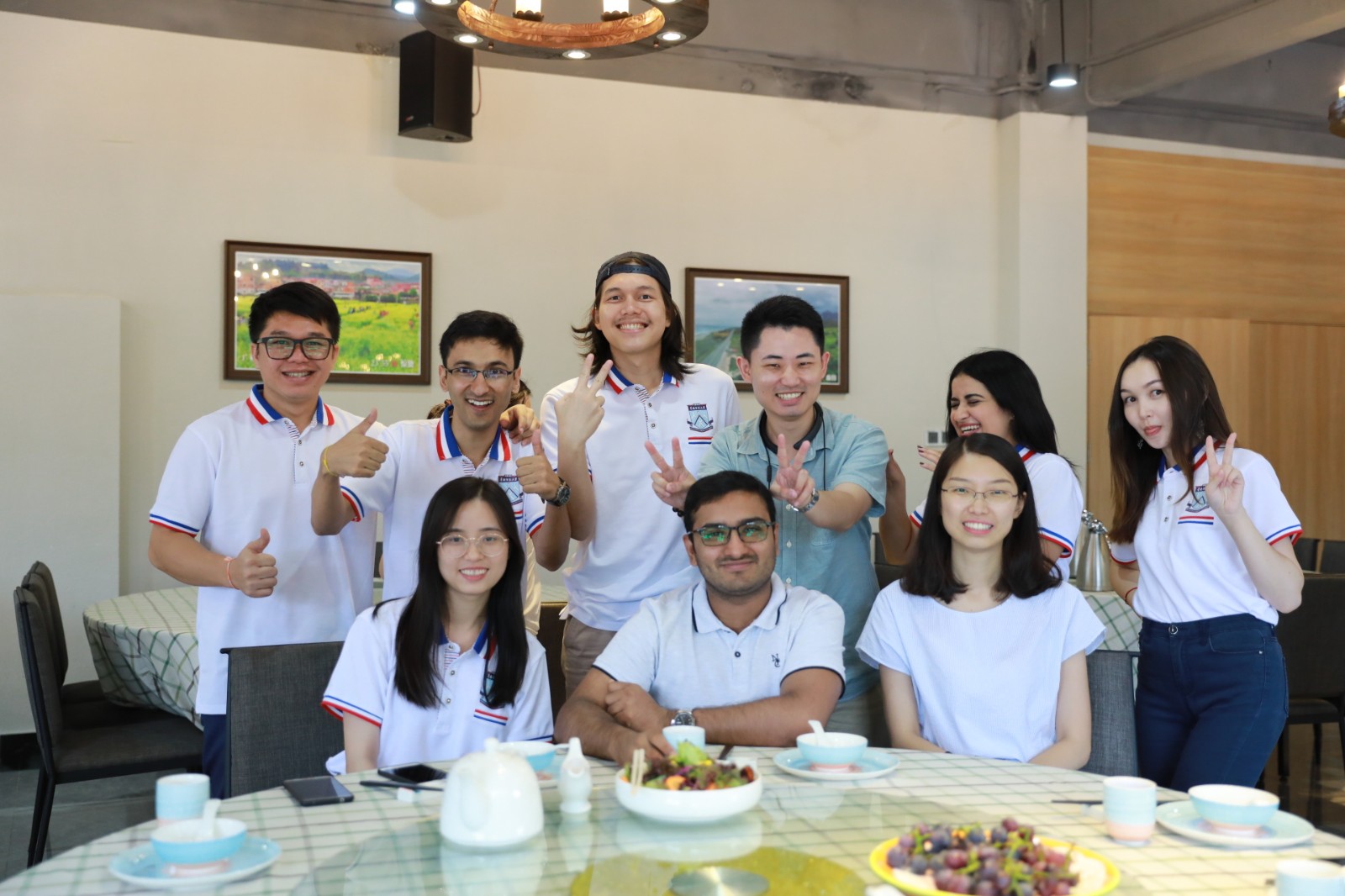 Abbas Zaheer (second left, back row) enjoys his time with his friends in China.jpg